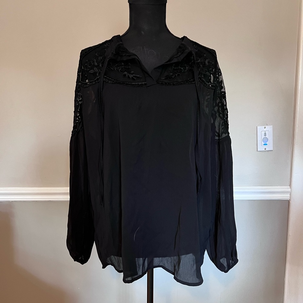 Black, loose fitting blouse, decorated sleeves